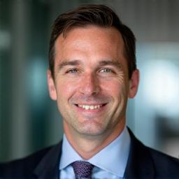 Professional headshot of Ben Carter.